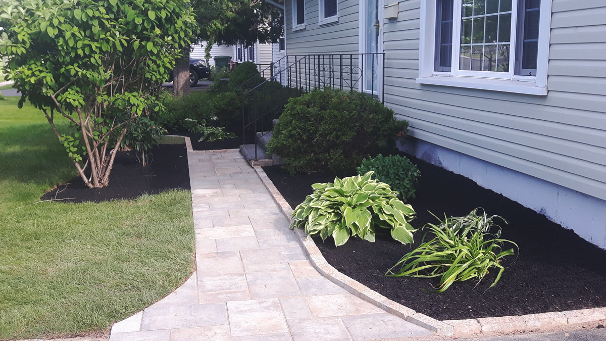 Nashwaaksis walkway, retaining wall, and bedding by Yards Apart Landscape & Design: photo 1